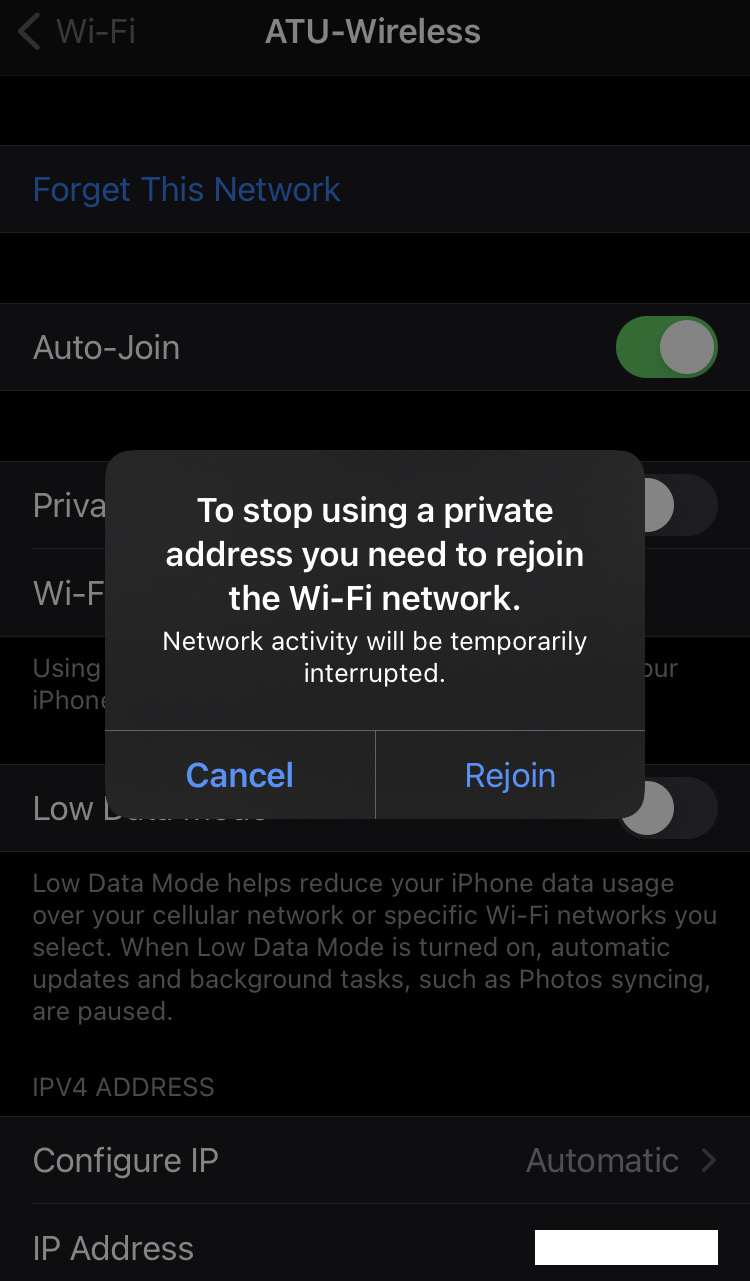 Confirmation popup on Apple mobile to turn off Private or Randomized MAC addressing for a particular wireless network.